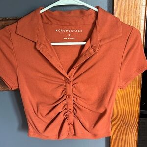 Brunt orange color, size small, brand Aeropostale